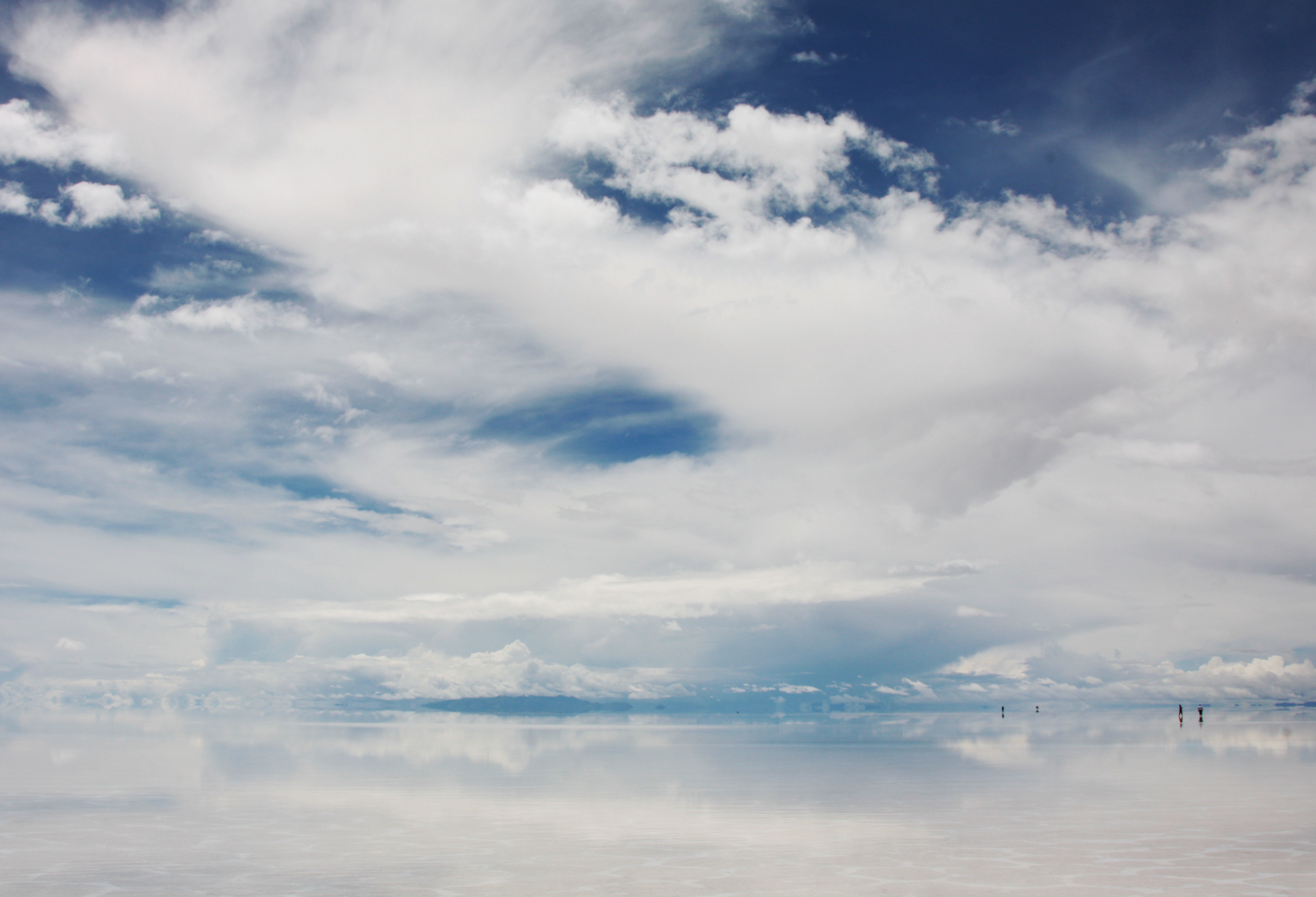 The sky is very blue. Those clouds are creamy white.